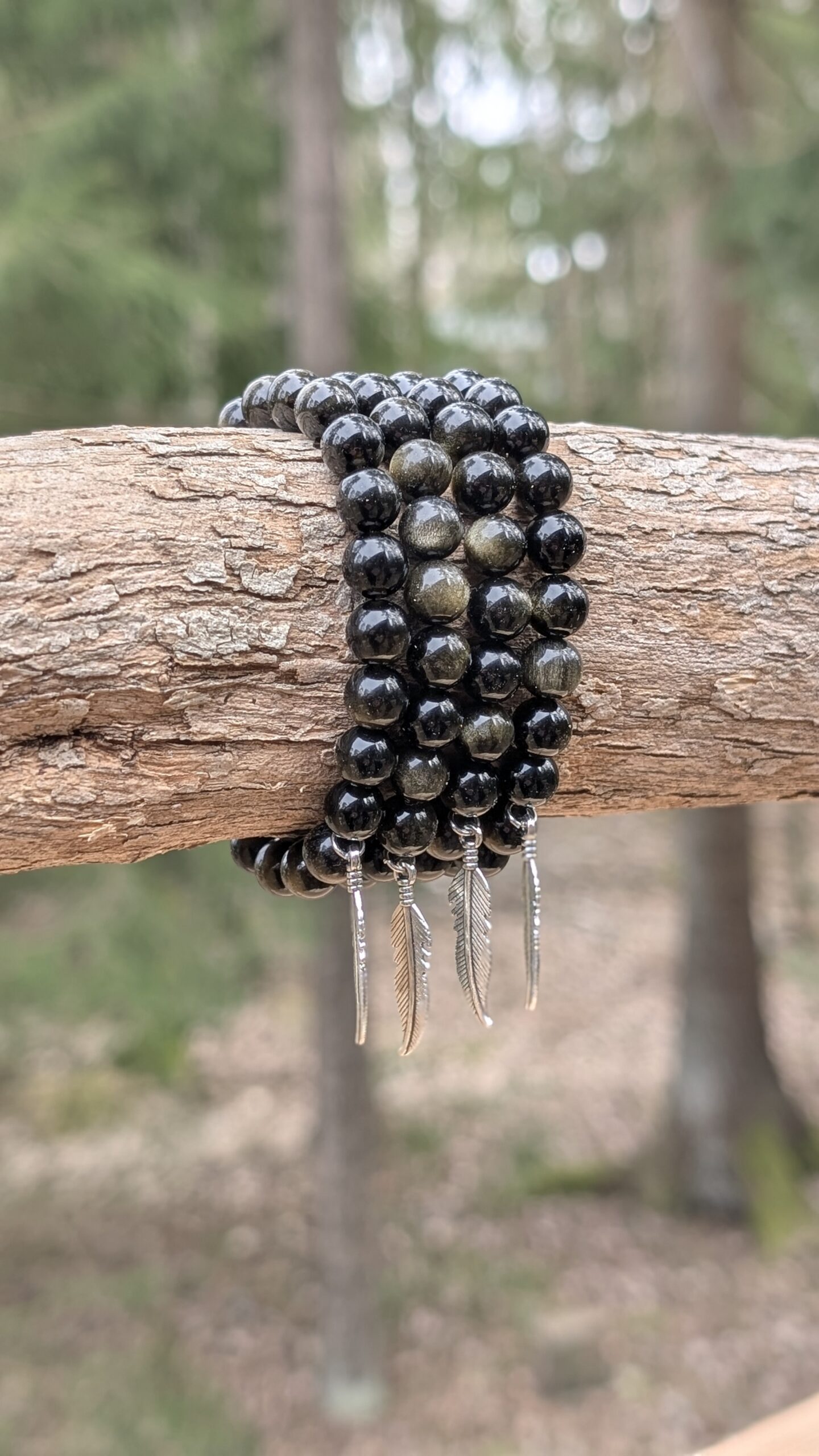 Rannekoru, Kultainen Obsidiaani sulkariipuksella